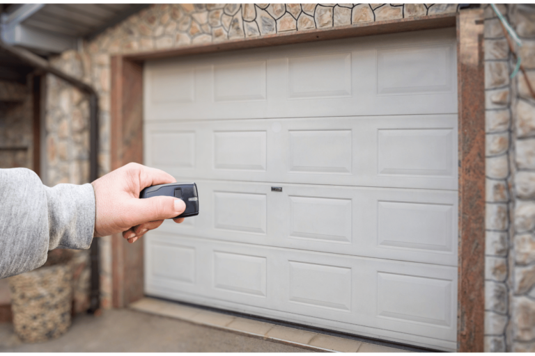 What causes a garage door to close then open back up