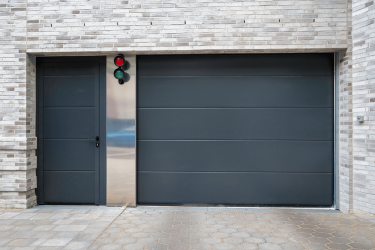 Why does my garage door go down 2 feet then back up